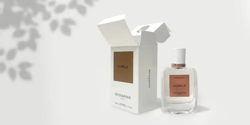 Minimalist folding carton perfume box with gold foil stamping for a modern fragrance brand